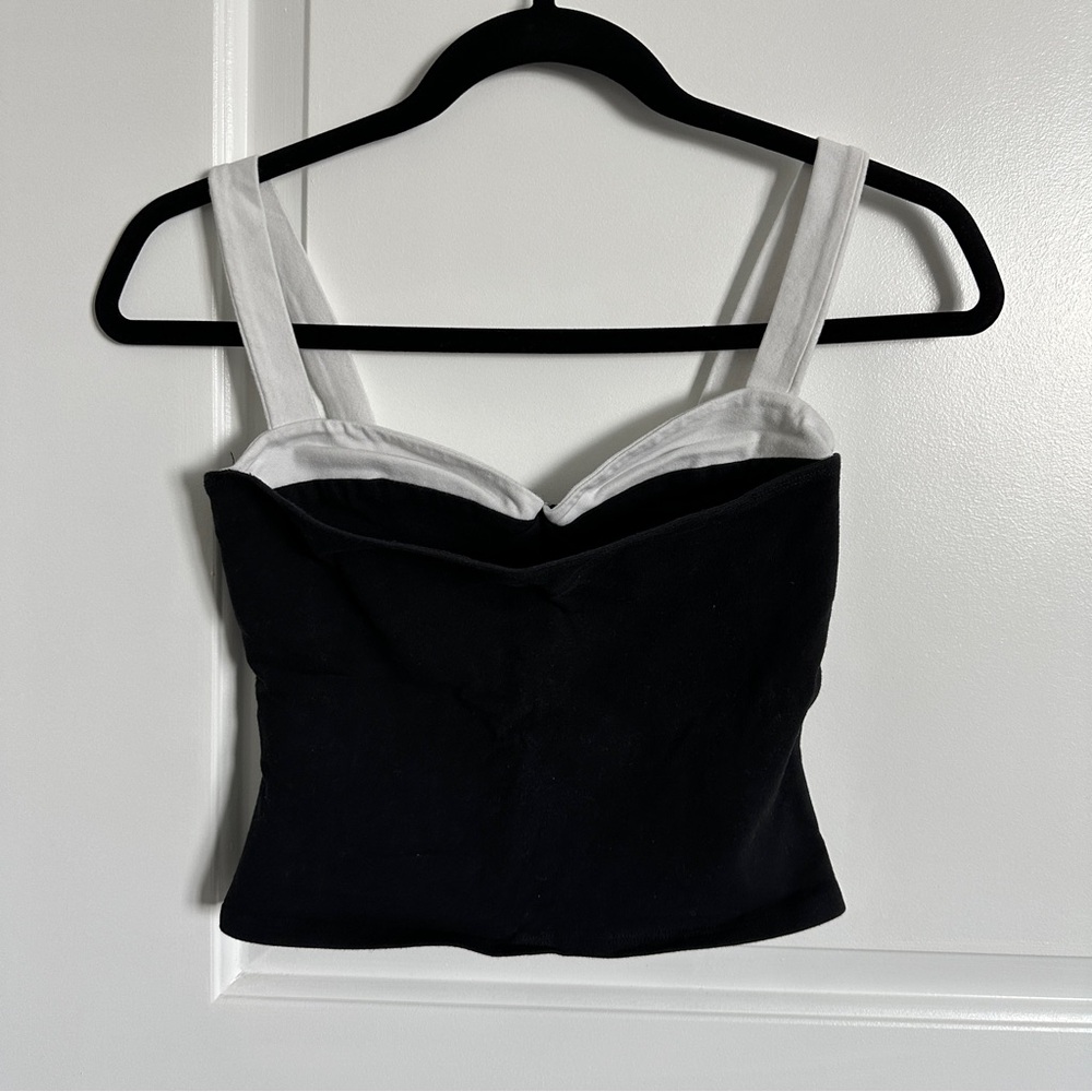 Reformation Harlan knitted tank top in a black and white color-block design